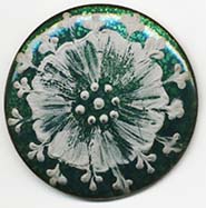 MUD Flower on enamel button
