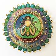 Bee button on felt