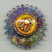 Bee button on felt