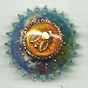 Bee button on felt