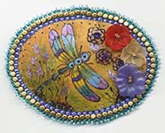 dragonfly button on gourd