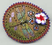 dragonfly button on gourd