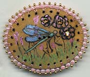 dragonfly button on gourd
