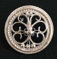 Filigree button